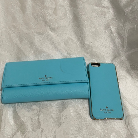 kate spade Accessories - Kate Spade leather phone wallet ♠️